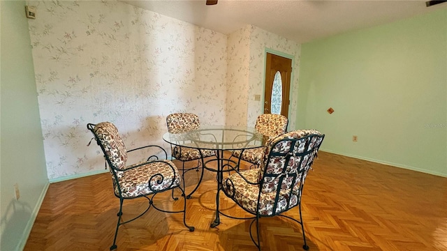 1301 Killian St, Daytona Beach, FL 32114 - dining space featuring wallpapered walls, baseboards, a ceiling fan, and a textured ceiling