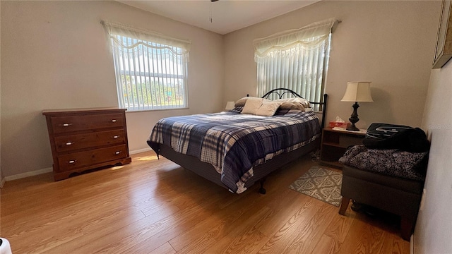 1301 Killian St, Daytona Beach, FL 32114 - bedroom with light wood-style floors and baseboards