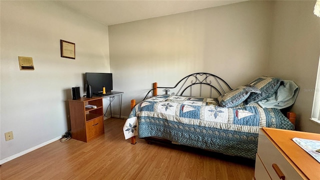 1301 Killian St, Daytona Beach, FL 32114 - bedroom featuring wood finished floors and baseboards