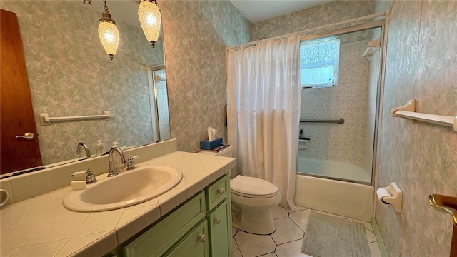 1301 Killian St, Daytona Beach, FL 32114 - full bathroom featuring vanity, shower / bath combo with shower curtain, tile patterned floors, and toilet