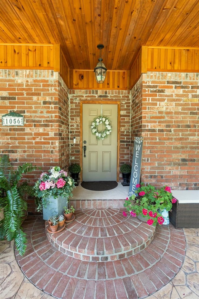 1056 Reynolds Rd, De Leon Springs, FL 32130 - entrance to property featuring brick siding