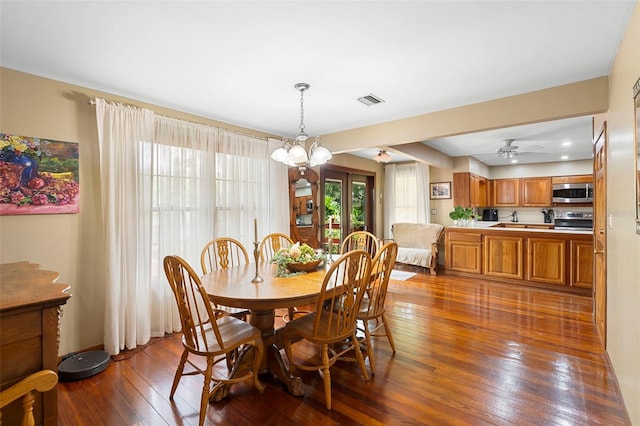 1056 Reynolds Rd, De Leon Springs, FL 32130 - dining room with dark wood finished floors, french doors, and ceiling fan