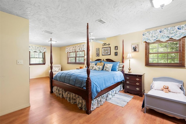 1056 Reynolds Rd, De Leon Springs, FL 32130 - bedroom featuring wood finished floors and baseboards