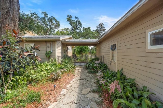1056 Reynolds Rd, De Leon Springs, FL 32130 - view of home's exterior featuring metal roof
