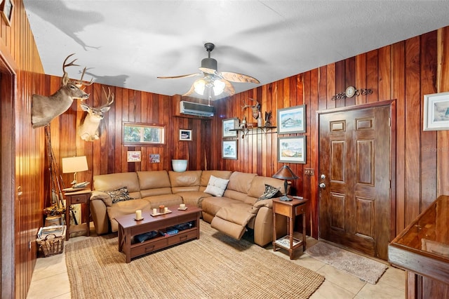 1056 Reynolds Rd, De Leon Springs, FL 32130 - living area with an AC wall unit, light tile patterned floors, wood walls, and ceiling fan