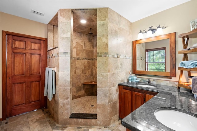 1056 Reynolds Rd, De Leon Springs, FL 32130 - full bathroom with vanity, walk in shower, and tile patterned flooring