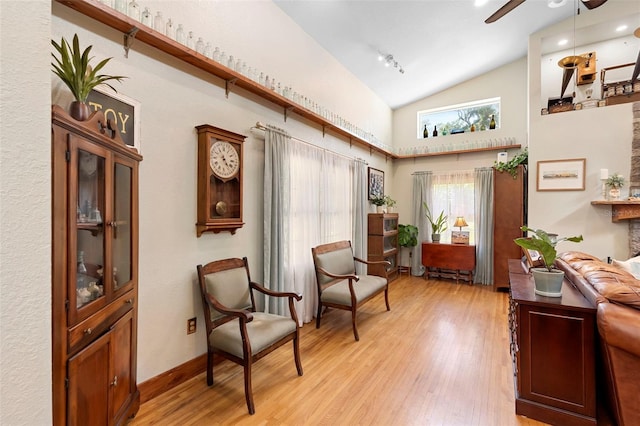 1056 Reynolds Rd, De Leon Springs, FL 32130 - living area with ceiling fan, light wood-type flooring, and high vaulted ceiling
