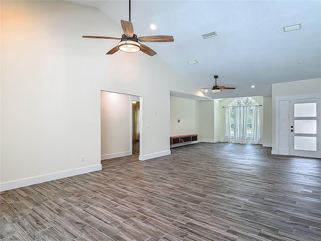 1520 Stone Trl, Enterprise, FL 32725 - unfurnished living room featuring a ceiling fan, dark wood-type flooring, baseboards, and high vaulted ceiling