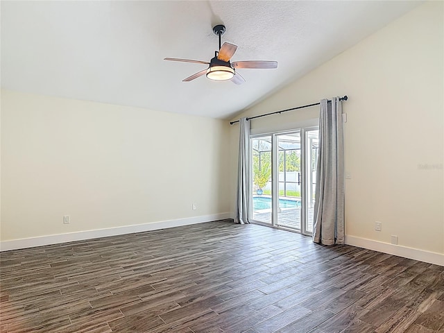 1520 Stone Trl, Enterprise, FL 32725 - empty room featuring vaulted ceiling, ceiling fan, dark wood-style flooring, and baseboards