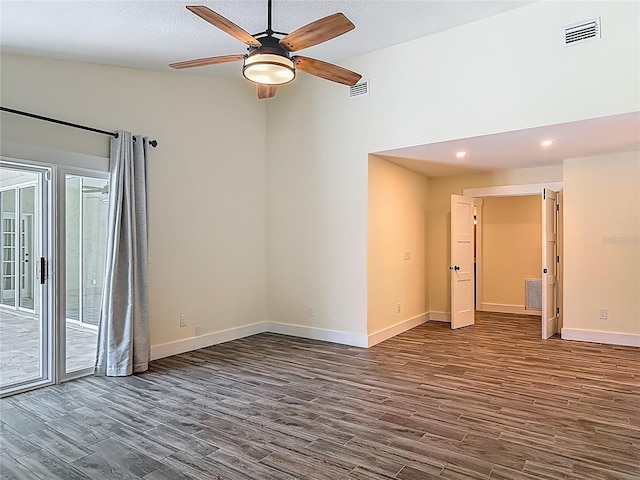 1520 Stone Trl, Enterprise, FL 32725 - spare room featuring dark wood-style floors, baseboards, a ceiling fan, and recessed lighting