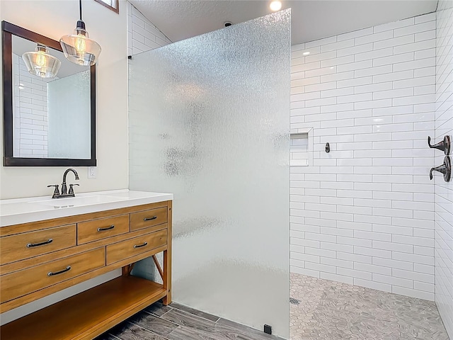 1520 Stone Trl, Enterprise, FL 32725 - bathroom with walk in shower, vanity, and a chandelier