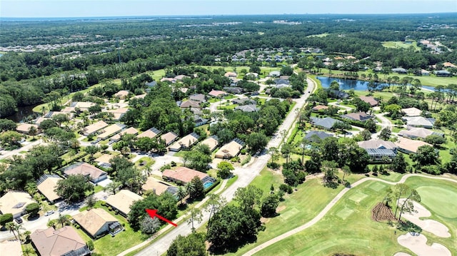438 Harbour Town Ln, Ormond Beach, FL 32174 - aerial view of property's location featuring a local golf course, nearby suburban area, and a large body of water