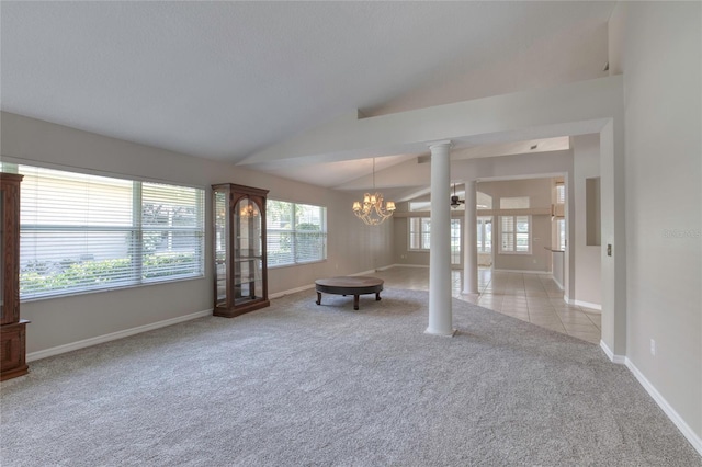 438 Harbour Town Ln, Ormond Beach, FL 32174 - living room with light colored carpet, vaulted ceiling, a chandelier, ornate columns, and baseboards