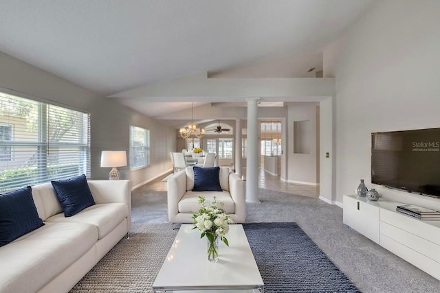 438 Harbour Town Ln, Ormond Beach, FL 32174 - living room featuring carpet, lofted ceiling, a chandelier, baseboards, and decorative columns