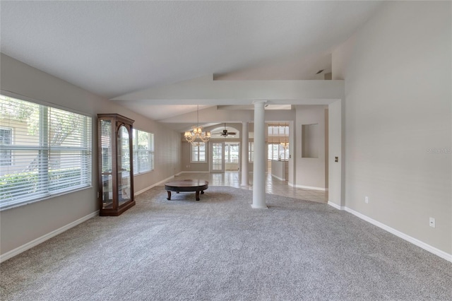 438 Harbour Town Ln, Ormond Beach, FL 32174 - carpeted spare room featuring vaulted ceiling, a chandelier, baseboards, and ornate columns