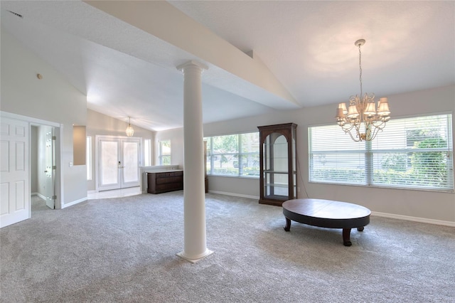 438 Harbour Town Ln, Ormond Beach, FL 32174 - living area featuring vaulted ceiling, french doors, carpet, and baseboards