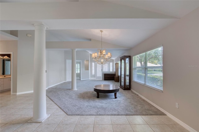 438 Harbour Town Ln, Ormond Beach, FL 32174 - unfurnished dining area with vaulted ceiling, decorative columns, light tile patterned floors, light carpet, and a chandelier