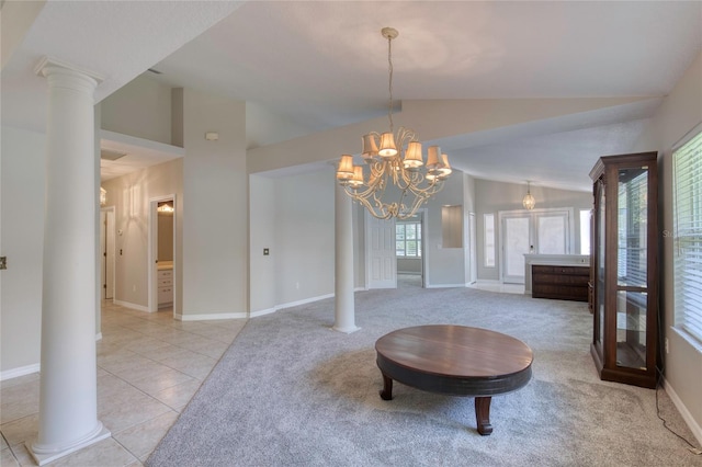 438 Harbour Town Ln, Ormond Beach, FL 32174 - dining room featuring lofted ceiling, a chandelier, light colored carpet, baseboards, and light tile patterned floors