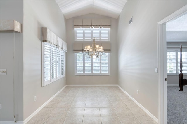 438 Harbour Town Ln, Ormond Beach, FL 32174 - unfurnished dining area featuring healthy amount of natural light, high vaulted ceiling, a chandelier, tile patterned flooring, and baseboards