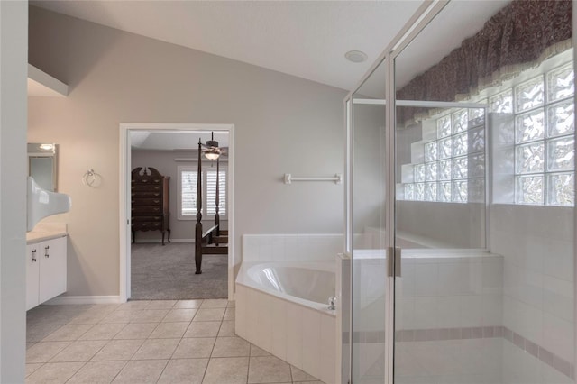 438 Harbour Town Ln, Ormond Beach, FL 32174 - bathroom featuring vanity, a bath, tile patterned flooring, a ceiling fan, and a shower stall