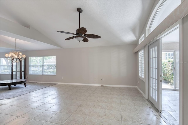 438 Harbour Town Ln, Ormond Beach, FL 32174 - spare room featuring lofted ceiling, light tile patterned floors, baseboards, a chandelier, and a ceiling fan