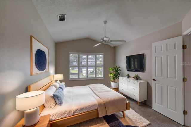 438 Harbour Town Ln, Ormond Beach, FL 32174 - carpeted bedroom with lofted ceiling and a ceiling fan