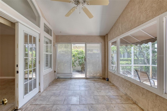 438 Harbour Town Ln, Ormond Beach, FL 32174 - unfurnished sunroom with stone finish flooring and vaulted ceiling