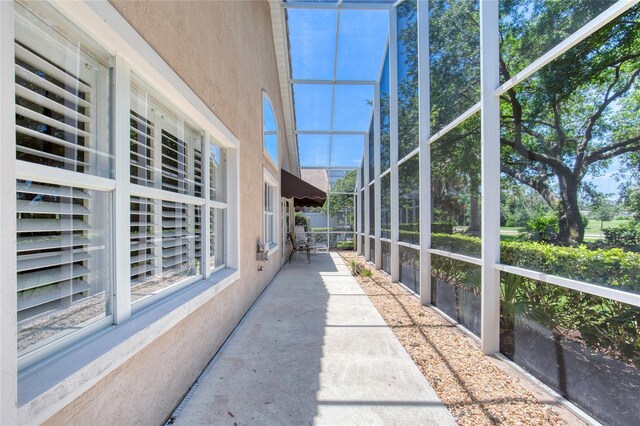 438 Harbour Town Ln, Ormond Beach, FL 32174 - unfurnished sunroom with plenty of natural light