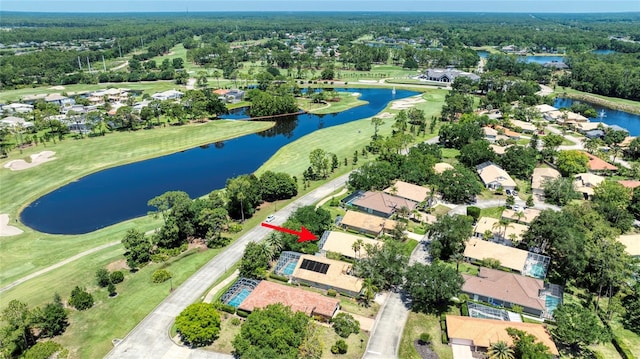 438 Harbour Town Ln, Ormond Beach, FL 32174 - aerial view of property and surrounding area featuring nearby suburban area, a large body of water, and a golf club