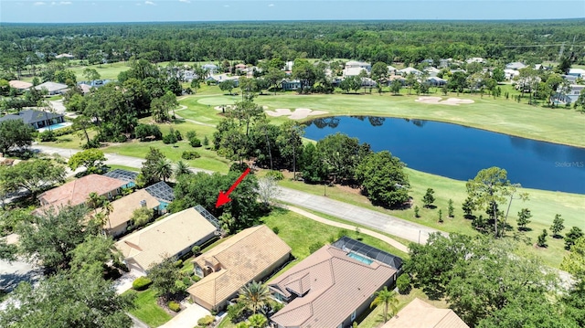 438 Harbour Town Ln, Ormond Beach, FL 32174 - aerial perspective of suburban area featuring a local golf course, a nearby body of water, and a forest