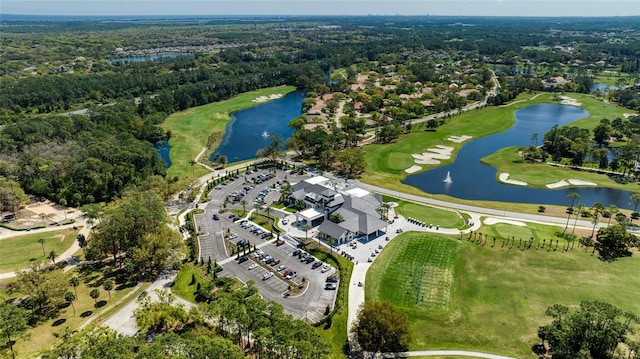 438 Harbour Town Ln, Ormond Beach, FL 32174 - aerial overview of property's location with a nearby body of water, a forest, and a golf club