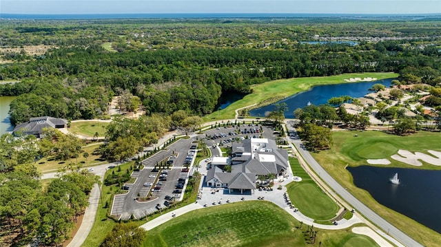 438 Harbour Town Ln, Ormond Beach, FL 32174 - aerial overview of property's location with a forest, a large body of water, and a local golf course