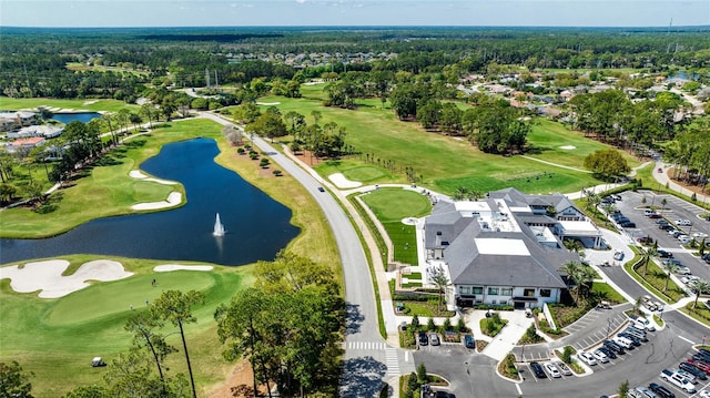 438 Harbour Town Ln, Ormond Beach, FL 32174 - aerial view of property and surrounding area featuring a nearby body of water, a golf course, and nearby suburban area