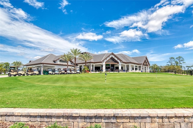 438 Harbour Town Ln, Ormond Beach, FL 32174 - view of front of property with an area to practice putting and view of golf course
