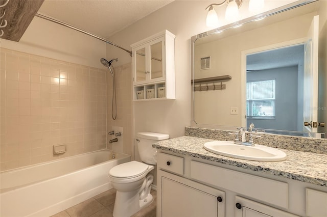 1401 S Palmetto Ave Unit 119, Daytona Beach, FL 32114 - bathroom with toilet, tile patterned floors, vanity, and shower / bath combination