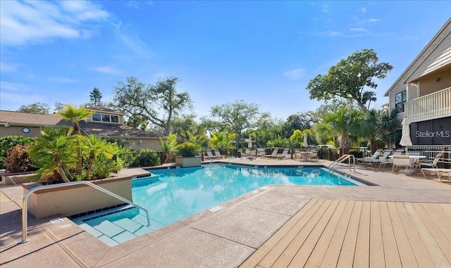1401 S Palmetto Ave Unit 119, Daytona Beach, FL 32114 - community pool featuring a patio area