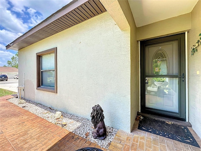 12 Emmons Ln Unit A & B, Palm Coast, FL 32164 - property entrance featuring stucco siding