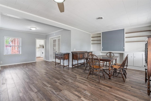 1411 Cliff Ave, Eustis, FL 32726 - dining space with ornamental molding, wood finished floors, a ceiling fan, and baseboards