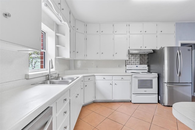 1411 Cliff Ave, Eustis, FL 32726 - kitchen featuring appliances with stainless steel finishes, a sink, under cabinet range hood, and light countertops