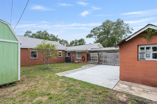 1411 Cliff Ave, Eustis, FL 32726 - view of yard featuring a patio, central AC, and concrete driveway