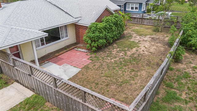 1411 Cliff Ave, Eustis, FL 32726 - fenced backyard with a patio area