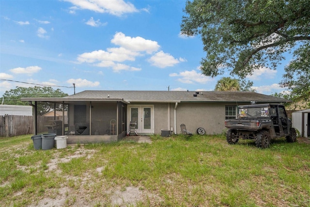 137 Fort Smith Blvd, Deltona, FL 32738 - back of house with a sunroom, stucco siding, french doors, and cooling unit