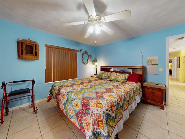 1229 Jeffery Dr, Port Orange, FL 32129 - bedroom with tile patterned floors, ceiling fan, and baseboards