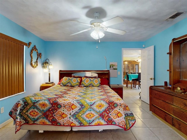 1229 Jeffery Dr, Port Orange, FL 32129 - tiled bedroom with a ceiling fan