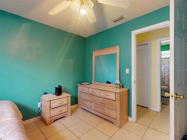 1229 Jeffery Dr, Port Orange, FL 32129 - bedroom featuring light tile patterned flooring, baseboards, and a ceiling fan