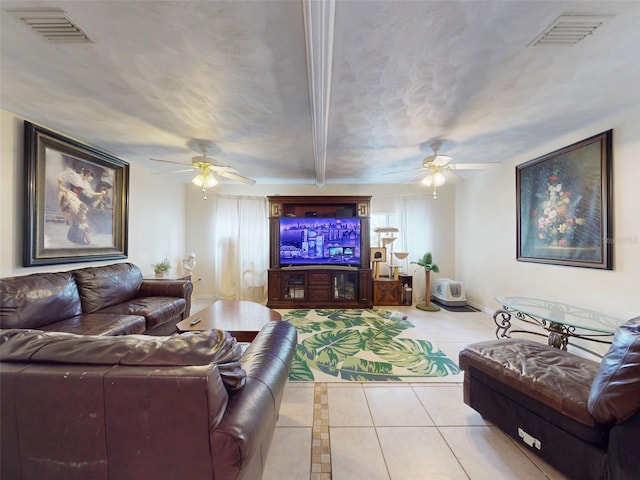 1229 Jeffery Dr, Port Orange, FL 32129 - living room featuring a ceiling fan, tile patterned floors, and beam ceiling