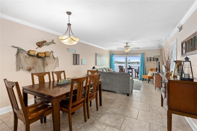 2711 N Halifax Ave Unit 264, Daytona Beach, FL 32118 - dining space with a ceiling fan, ornamental molding, and light tile patterned floors