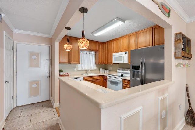 2711 N Halifax Ave Unit 264, Daytona Beach, FL 32118 - kitchen featuring white appliances, a sink, a peninsula, ornamental molding, and light countertops