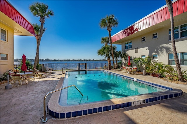2711 N Halifax Ave Unit 264, Daytona Beach, FL 32118 - community pool featuring a patio area and a water view