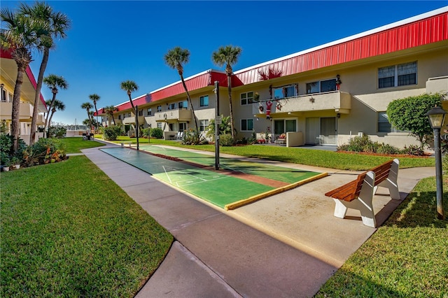 2711 N Halifax Ave Unit 264, Daytona Beach, FL 32118 - view of property's community with a yard, shuffleboard, and a residential view